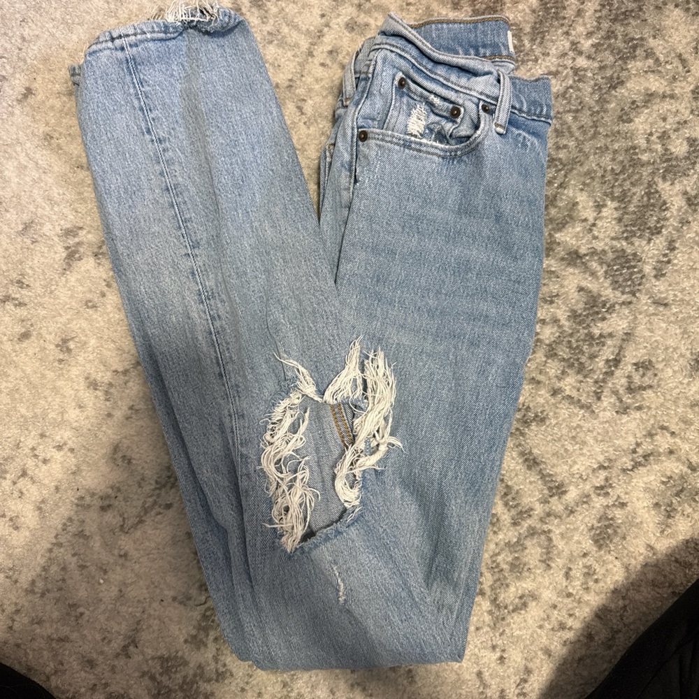 24/00 Abercrombie Jeans. Holes on both knees, in very good condition.